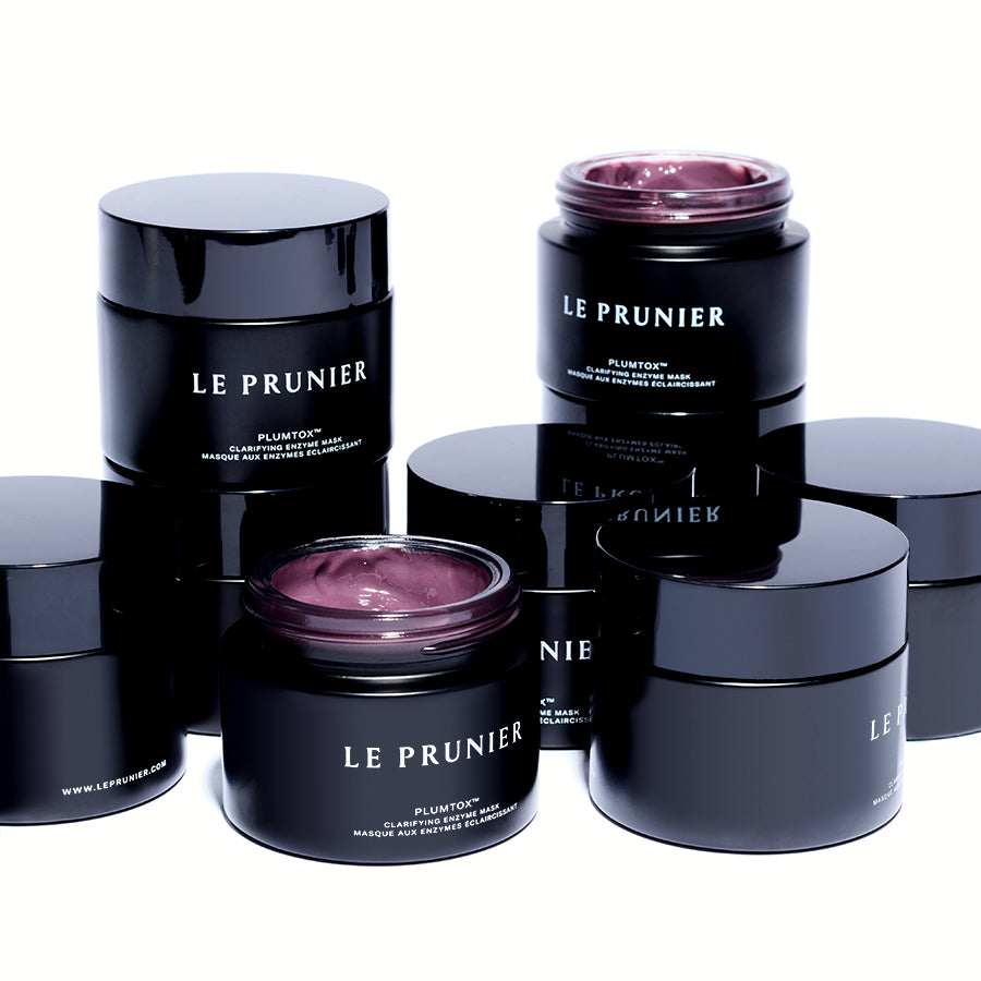 Group of Le Prunier Plumtox Clarifying Enzyme Mask jars, open and closed, showing the pink mask | Botā natural skincare.