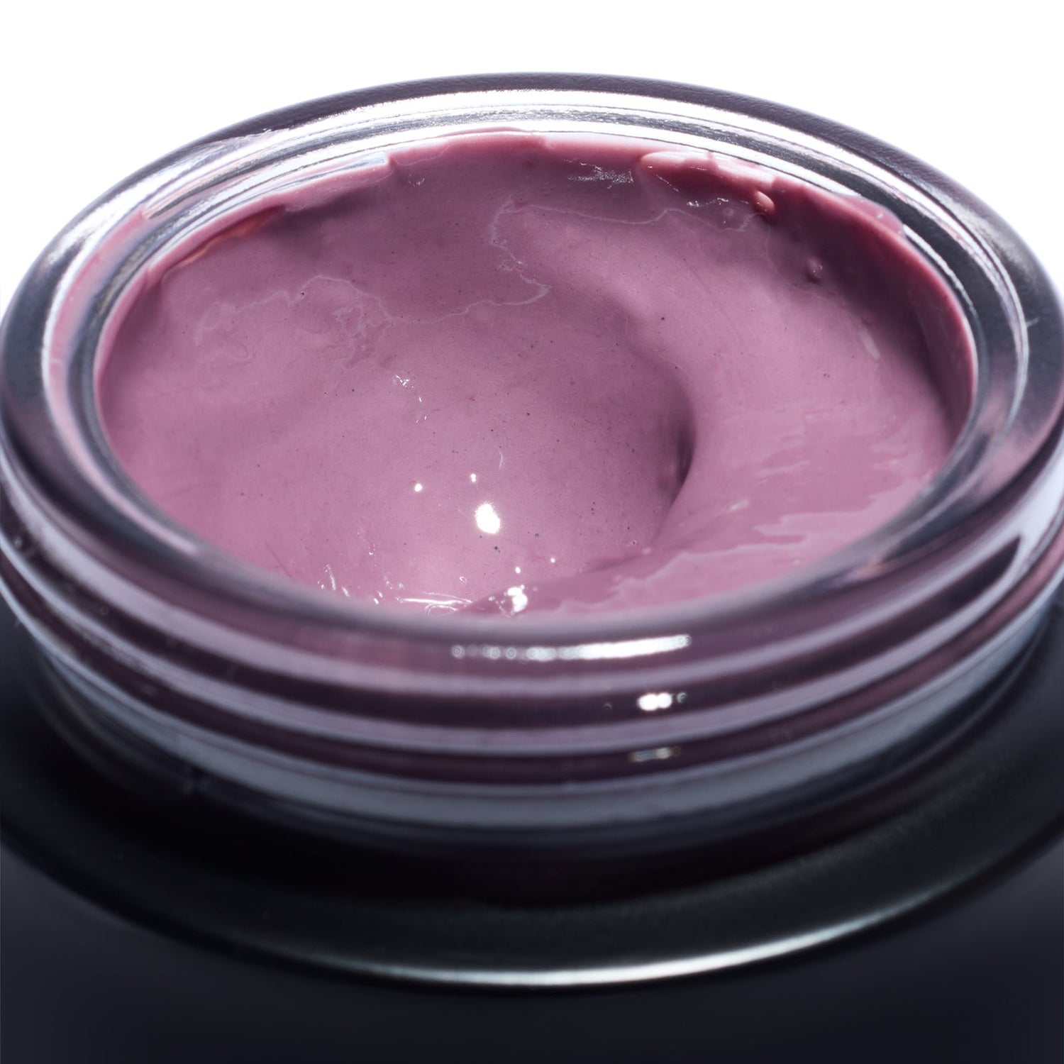 Close-up of the soft pink plum enzyme mask texture inside an open Le Prunier Plumtox jar | Botā natural skincare.