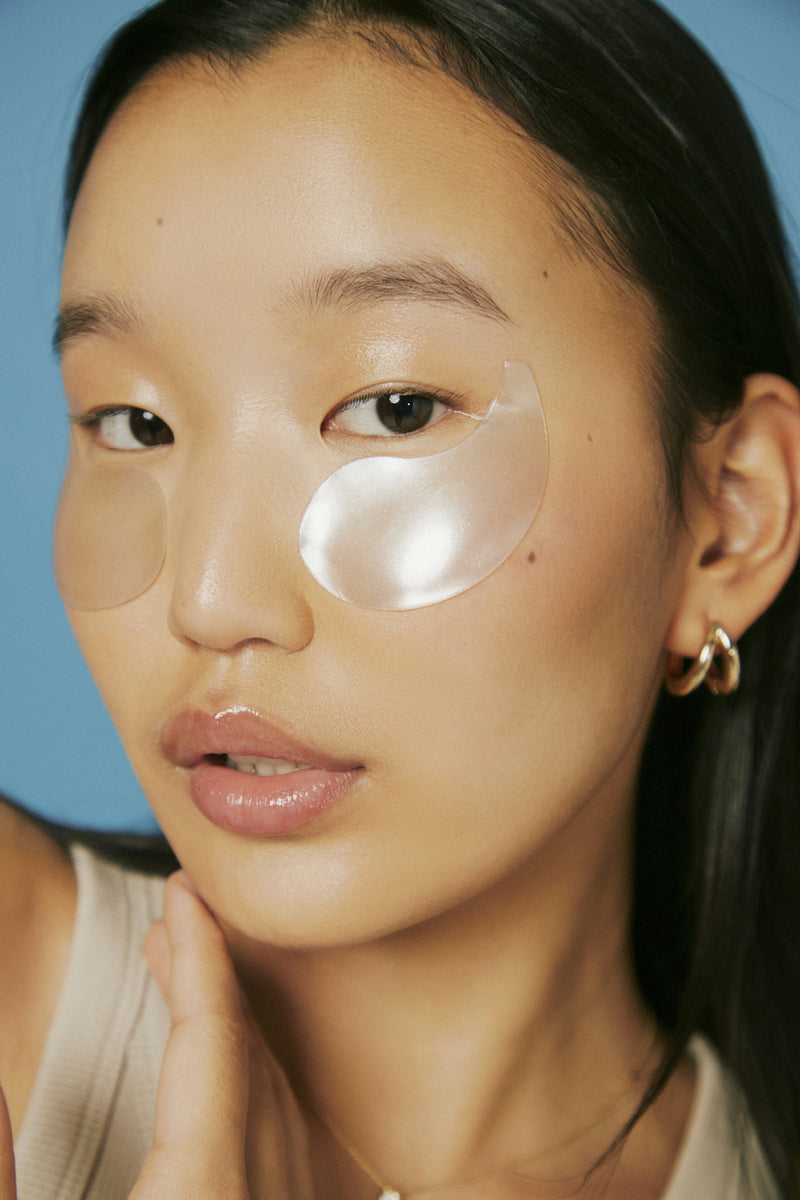 Step-by-step eye cream application technique for reducing fine lines and dark circles